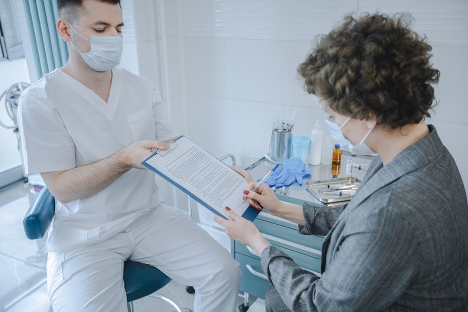 Therapist superbill document with CPT codes and patient submitting reimbursement claim online