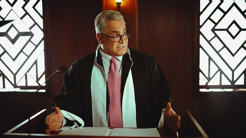 Mental health court judge speaking with defendant and case manager during specialized court hearing