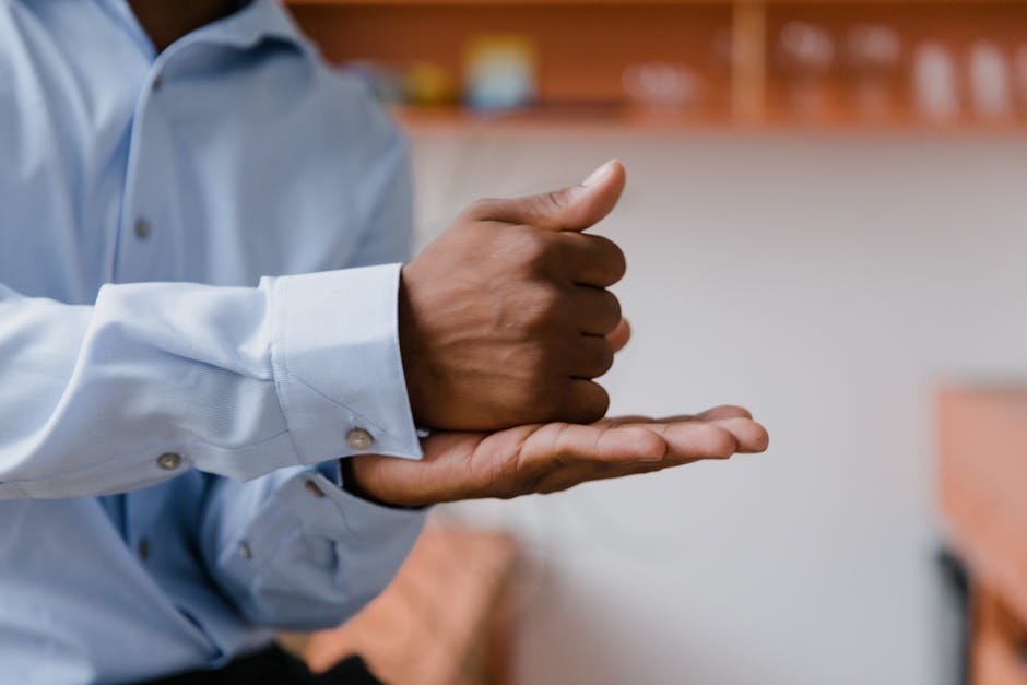 Deaf therapist signing in ASL during a video session with client