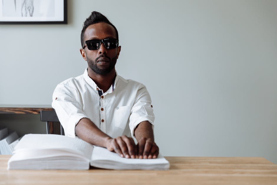 Blind man using screen reader during accessible mental health teletherapy session