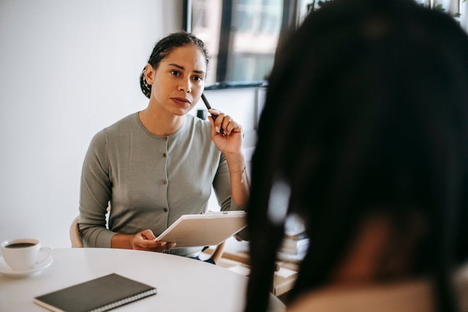 Therapist and patient discussing step up from weekly therapy to IOP