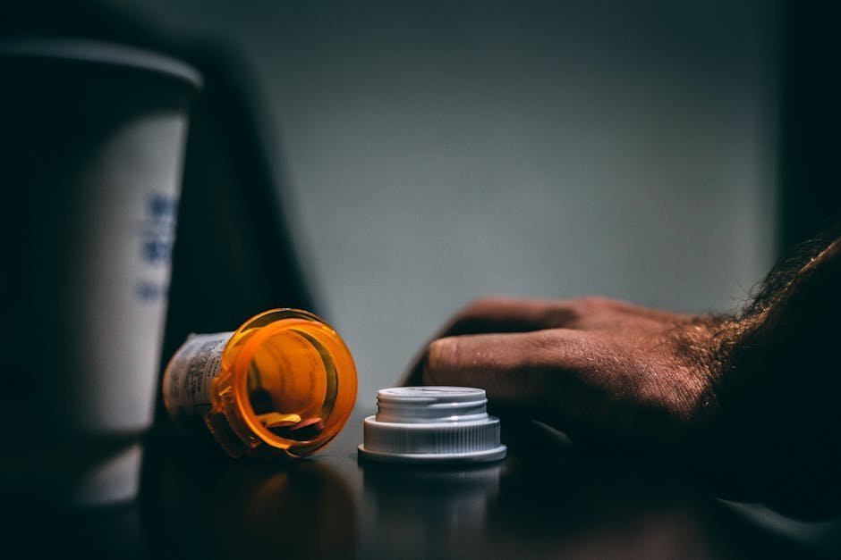 Lithium carbonate prescription bottle on a bedside table beside a calendar marked with a tapering schedule