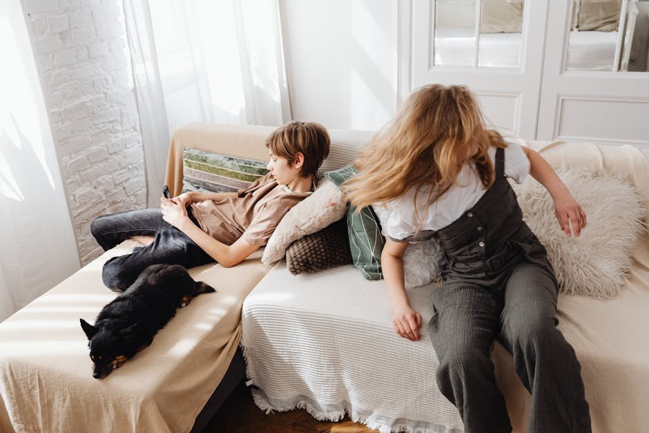 Concerned sister speaking with brother in cluttered apartment during mental health crisis intervention