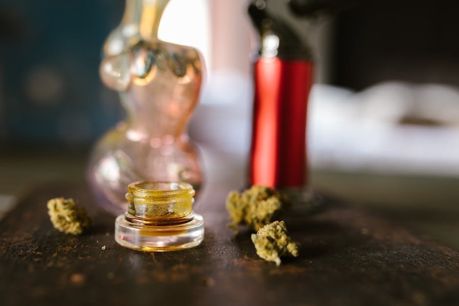 High-THC cannabis concentrate next to ER admission paperwork representing cannabis psychosis emergency