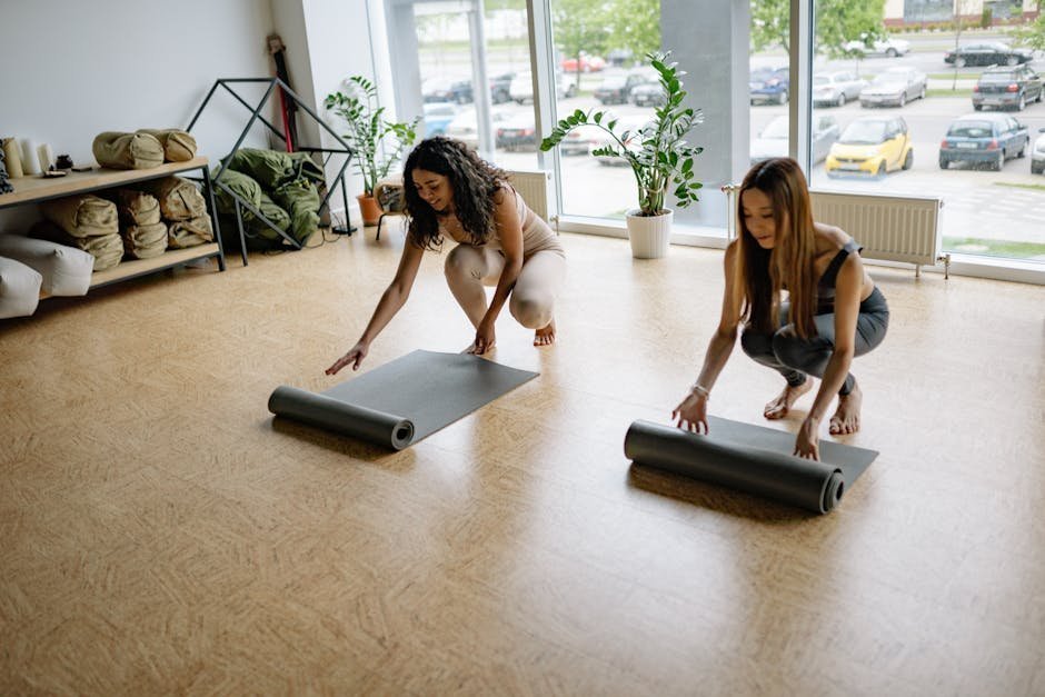 Quiet yoga room with mats arranged in a circle and natural light